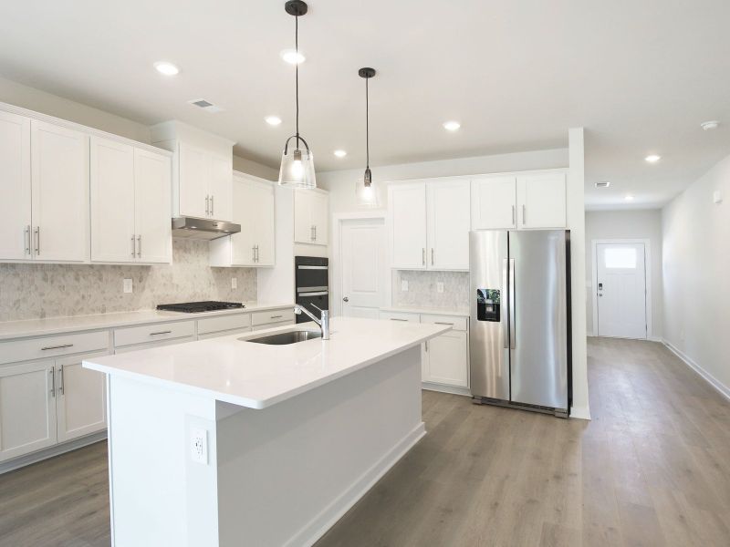 Kitchen in the Sherwood floorplan in a Meritage Homes community. Kitchen in the Sherwood floorplan in a Meritage Homes community.