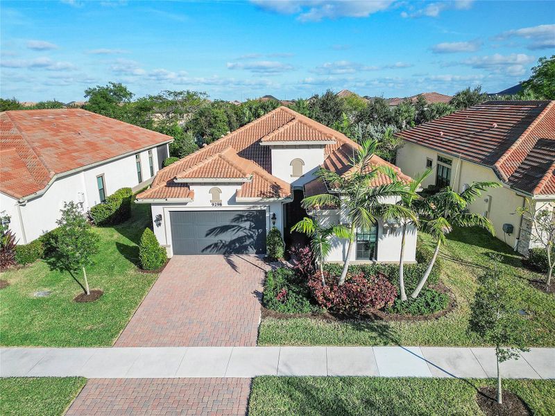 Beautiful Curb appeal -wide setbacks and great open space! LUSH landscape & private back yard to enjoy!