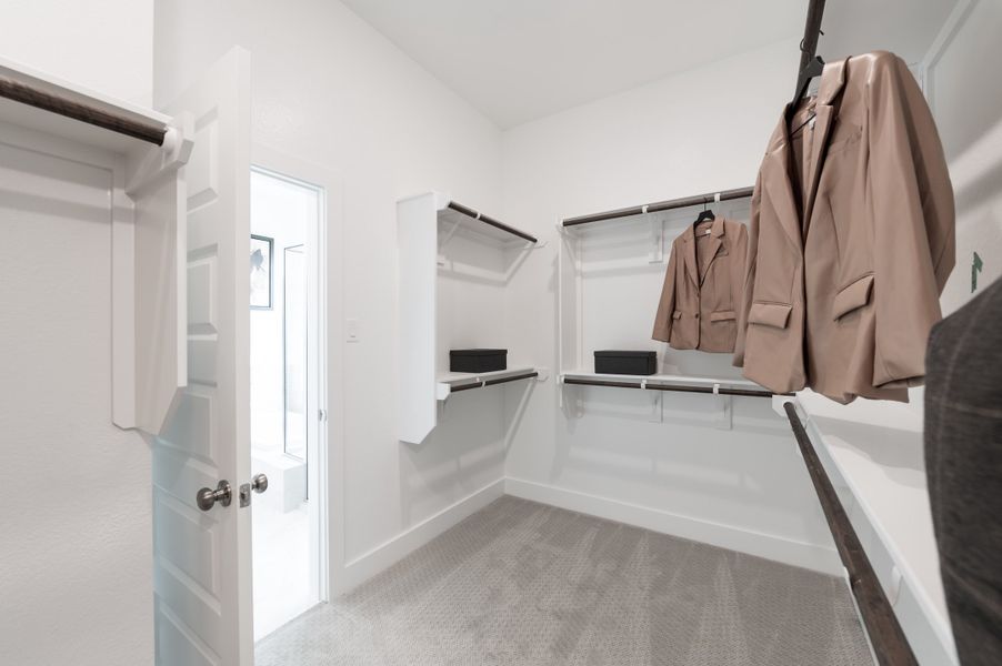 Representative furnished interior of a home built from the Wren by Tri Pointe Homes in Oakhill Reserve, Tomball (Image 24).