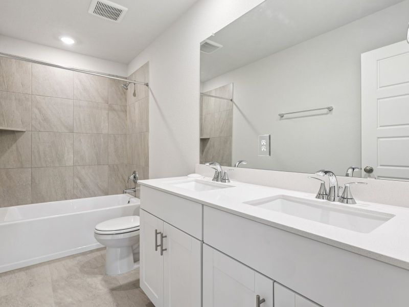 Furnished interior view inside a new home in Riviera Pines - Traditional Series, Huffman (Image 10).