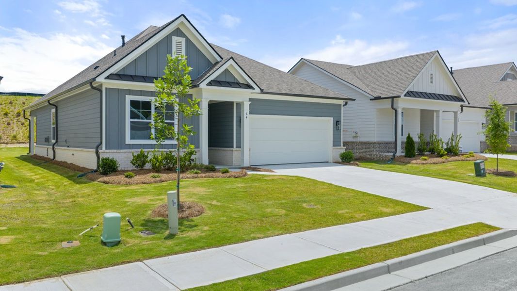Representative exterior photo of a completed home built from the ACADIA by D.R. Horton in Hamptons at Riverwood South, Dallas, GA (Image 23).