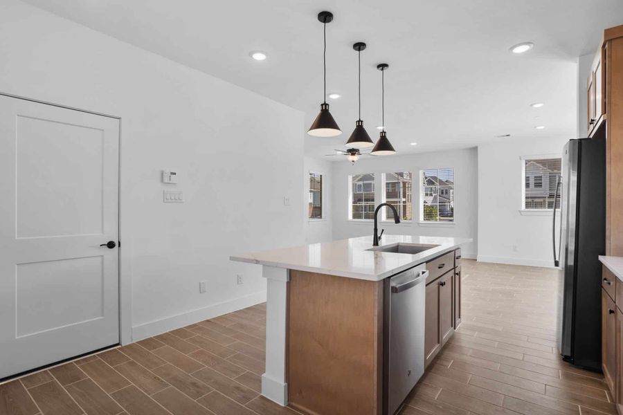 Furnished interior view inside a new home in Meridiana, Manvel (Image 8).
