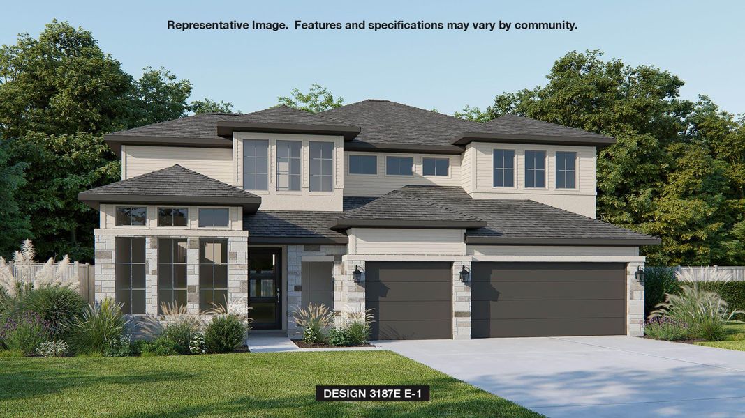 Prairie-style home with driveway, stone siding, an attached garage, and a front lawn