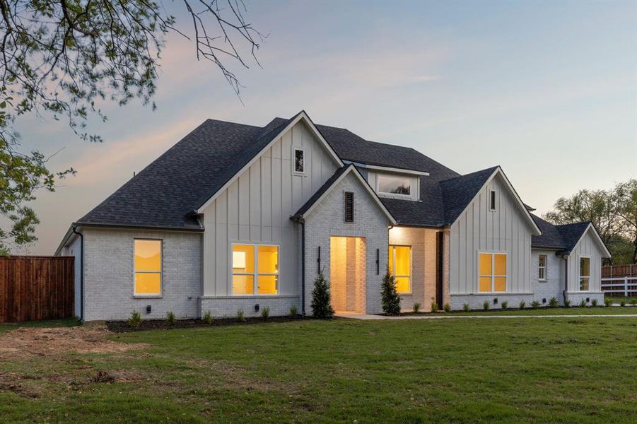 Front exterior of a new home in , Rowlett, TX, highlighting curb appeal (Image 22). Front exterior of a new home in , Rowlett, TX, highlighting curb appeal (Image 22).