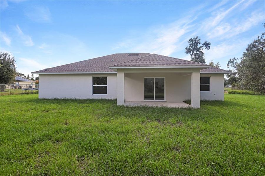 Exterior details and patio area of a home in , Kissimmee (Image 3).