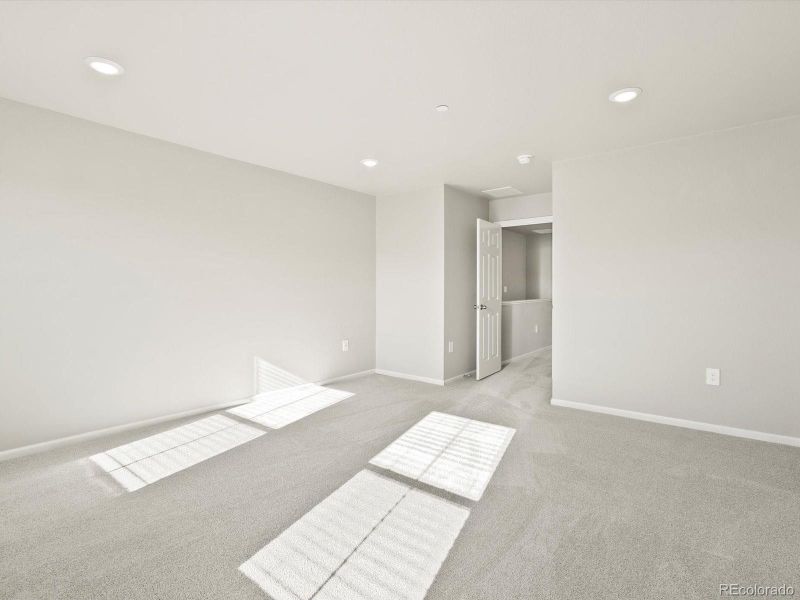 Spacious, unfurnished interior of a new home in Poudre Heights: The Meadow Collection, Windsor (Image 21).