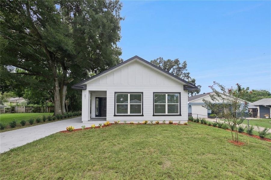 Front exterior of a new home in , Oakland, FL, highlighting curb appeal (Image 1). Front exterior of a new home in , Oakland, FL, highlighting curb appeal (Image 1).