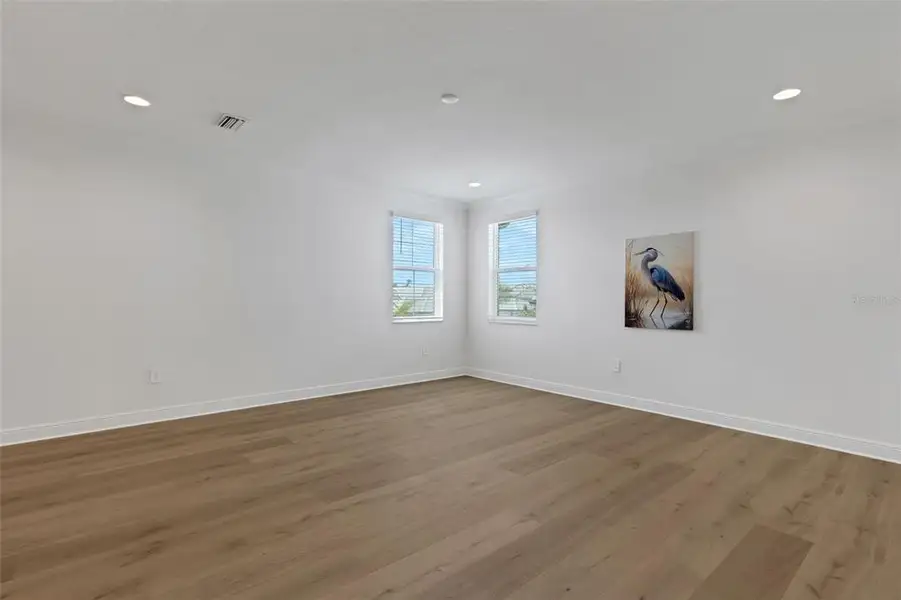 Spacious, unfurnished interior of a new home in Cassata Lakes, Nokomis (Image 64).