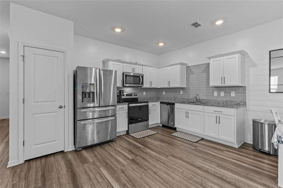 Furnished interior view inside a new home in , Winder (Image 5). Furnished interior view inside a new home in , Winder (Image 5).