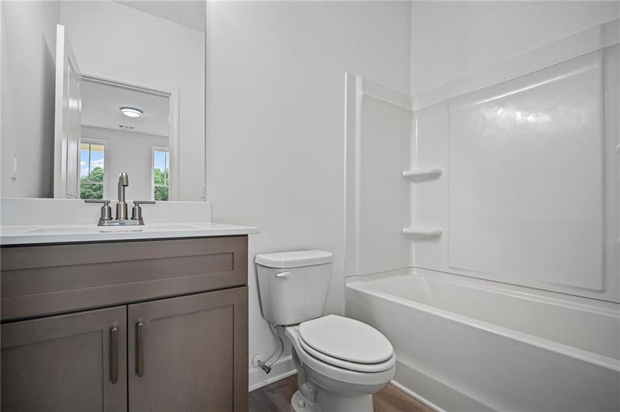 Furnished interior view inside a new home in The Village at River Green, Canton (Image 4).