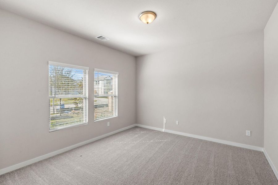 Spacious, unfurnished interior of a new home in Arabella on the Prairie 60', Richmond (Image 16).