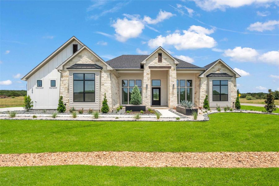 Front exterior of a new home in Daniels Mountain, Georgetown, TX, highlighting curb appeal (Image 21).