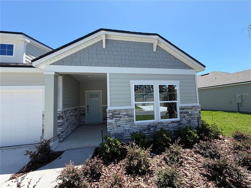 Exterior details and patio area of a home in Reserve East, Flagler Beach (Image 4).