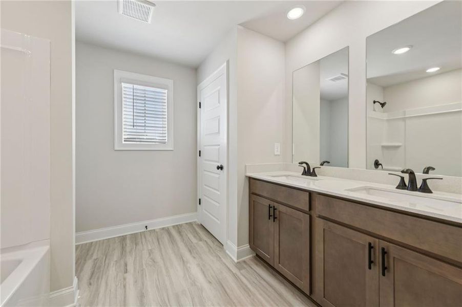 Furnished interior view inside a new home in Martin Springs - Estate Series, Lawrenceville (Image 12). Furnished interior view inside a new home in Martin Springs - Estate Series, Lawrenceville (Image 12).