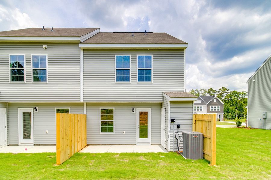 Exterior details and patio area of a home in Padgett Commons, Hopkins (Image 21).