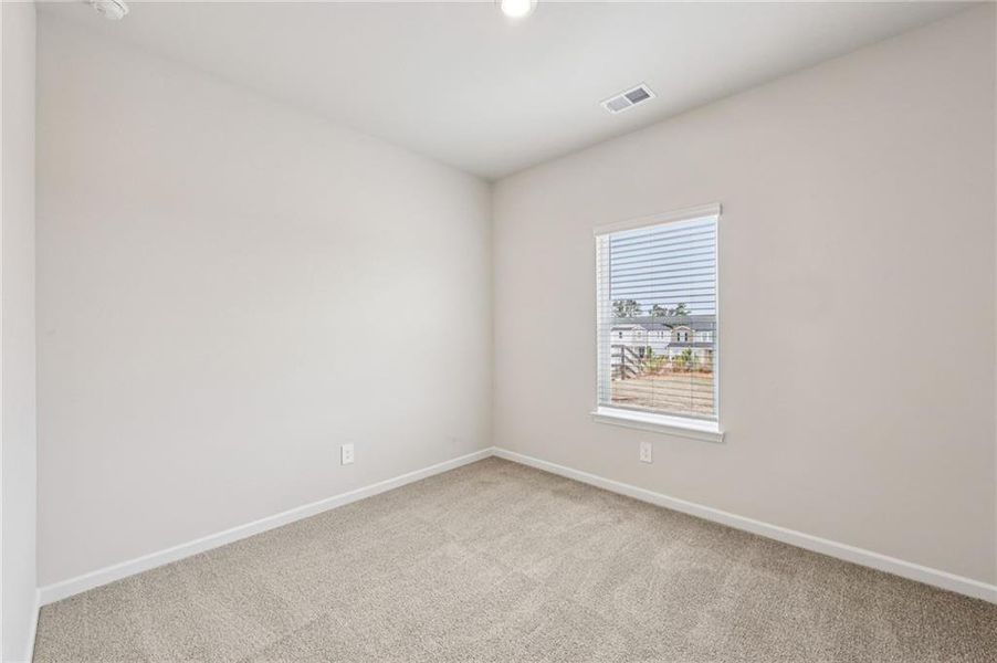 Spacious, unfurnished interior of a new home in Hawthorne Station, College Park (Image 22).