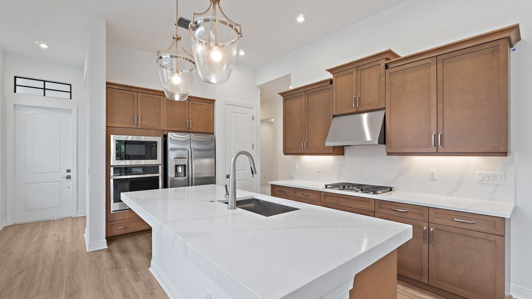 Furnished interior view inside a new home in Rivella, Port St. Lucie (Image 6).