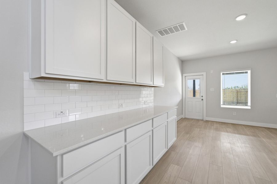 Furnished interior view inside a new home in Sunfield, Buda (Image 10).