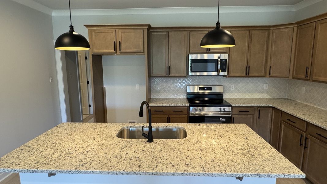 Furnished interior view inside a new home in The Greens at Legacy Townhomes, Springfield (Image 5).