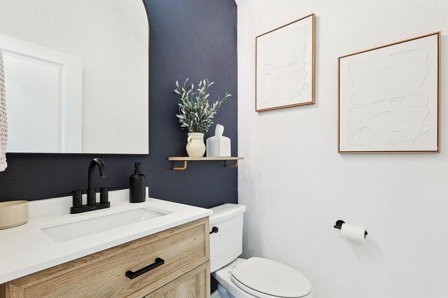 Bathroom with vanity and toilet