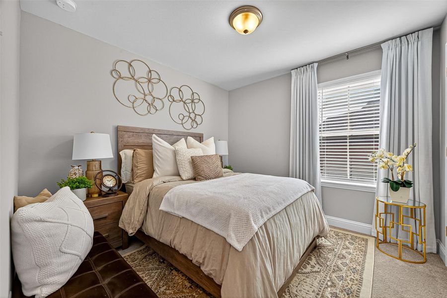 Furnished interior view inside a new home in Sunterra, Katy (Image 13).