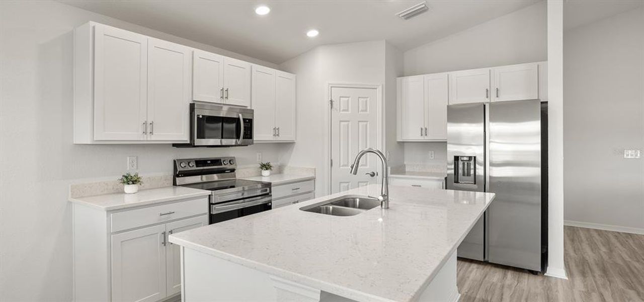 Furnished interior view inside a new home in Bennah Oaks, Belleview (Image 8).