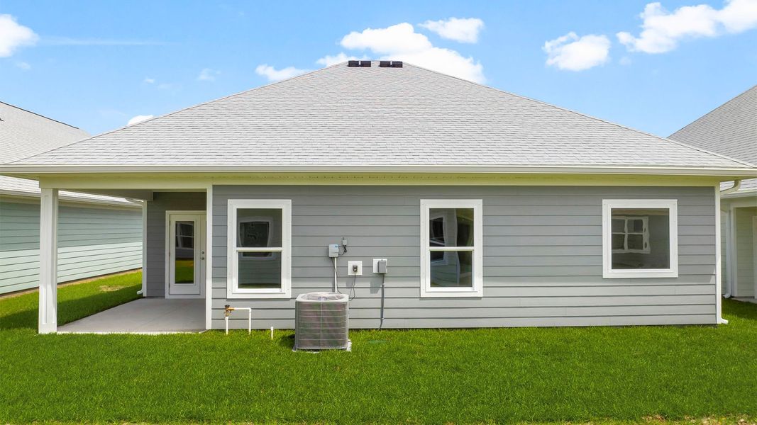 Exterior details and patio area of a home in WindMark Beach, Port Saint Joe (Image 4).