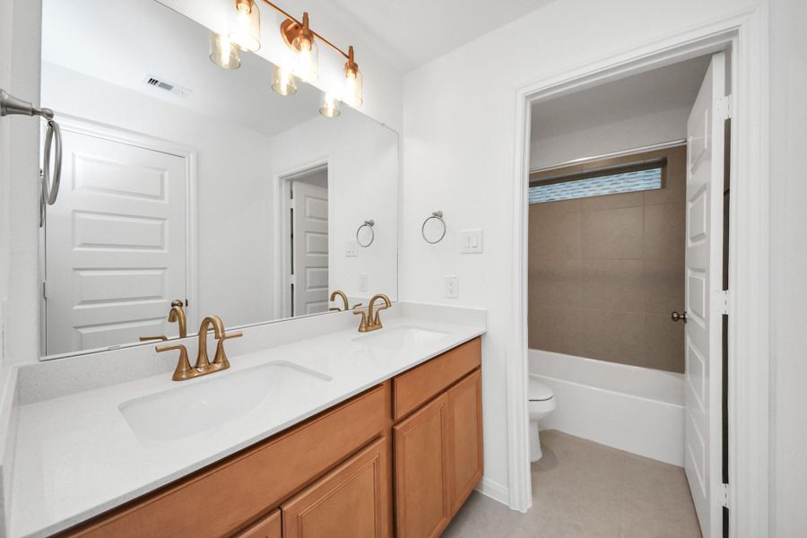 Furnished interior view inside a new home in Elyson, Katy (Image 12).