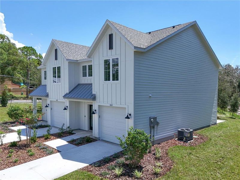 Front exterior of a new home in , Mount Dora, FL, highlighting curb appeal (Image 26).