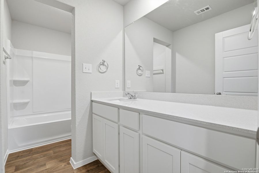 Furnished interior view inside a new home in Hunters Ranch, San Antonio (Image 8).