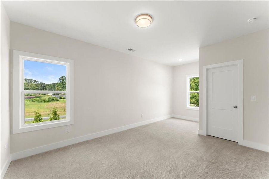 Spacious, unfurnished interior of a new home in Hillgrove Preserve, Powder Springs (Image 37).