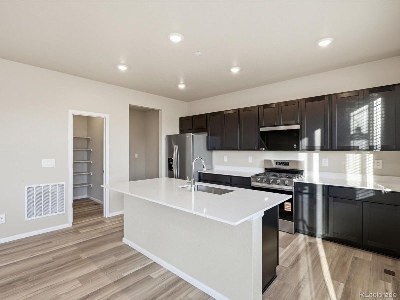 Furnished interior view inside a new home in , Commerce City (Image 8).