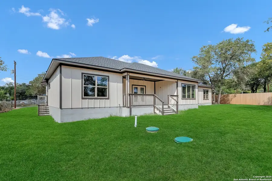 Front exterior of a new home in , Elmendorf, TX, highlighting curb appeal (Image 1).