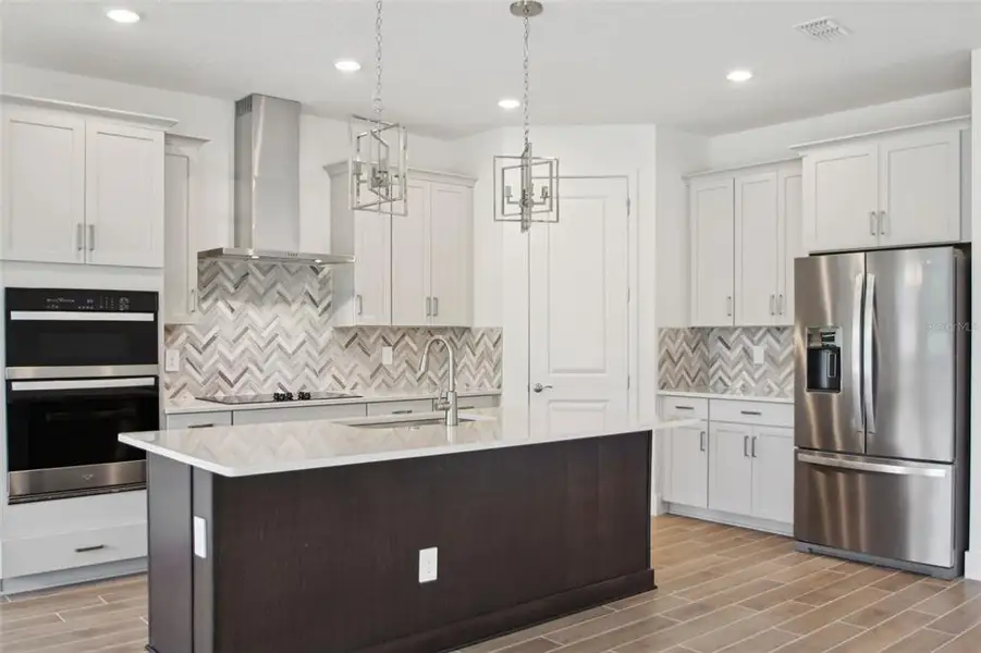 Furnished interior view inside a new home in Ridgehaven - Reserve Series, Ormond Beach (Image 6).
