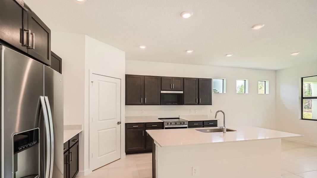 Representative furnished interior of a home built from the Delray by D.R. Horton in Twin Oaks, Stuart (Image 5).