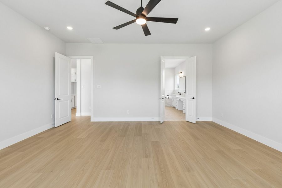 Spacious, unfurnished interior of a new home in Rainwater Crossing, Celina (Image 30).