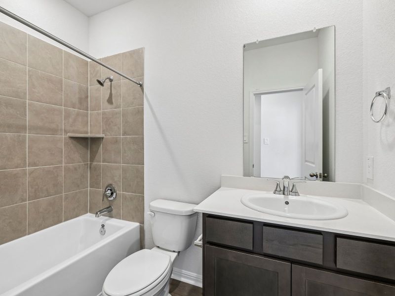Furnished interior view inside a new home in Waterstone Crossing, Kyle (Image 6).
