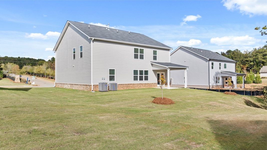 Exterior details and patio area of a home in Brooks Station, Dacula (Image 23).