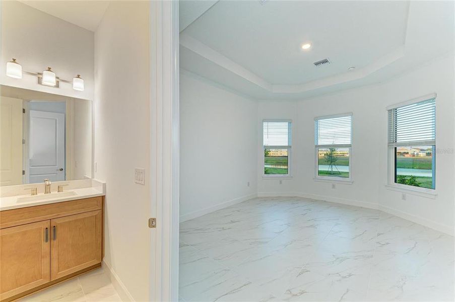 Spacious, unfurnished interior of a new home in Esplanade at Azario Lakewood Ranch, Lakewood Ranch (Image 50). Spacious, unfurnished interior of a new home in Esplanade at Azario Lakewood Ranch, Lakewood Ranch (Image 50).