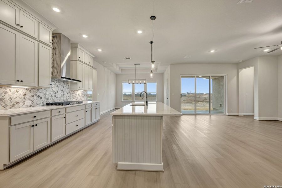 Furnished interior view inside a new home in Megans Landing – Half-Acre Homesites, Castroville (Image 11).
