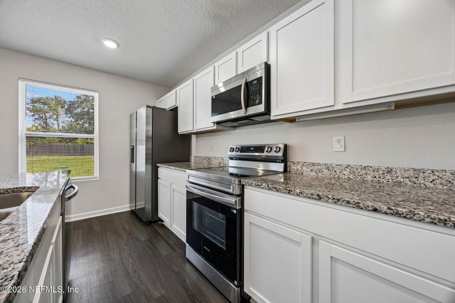 Furnished interior view inside a new home in , Jacksonville (Image 9). Furnished interior view inside a new home in , Jacksonville (Image 9).