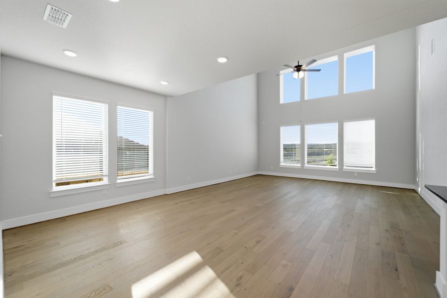 Spacious, unfurnished interior of a new home in The Woodlands at Medina Hills, Mico (Image 28).