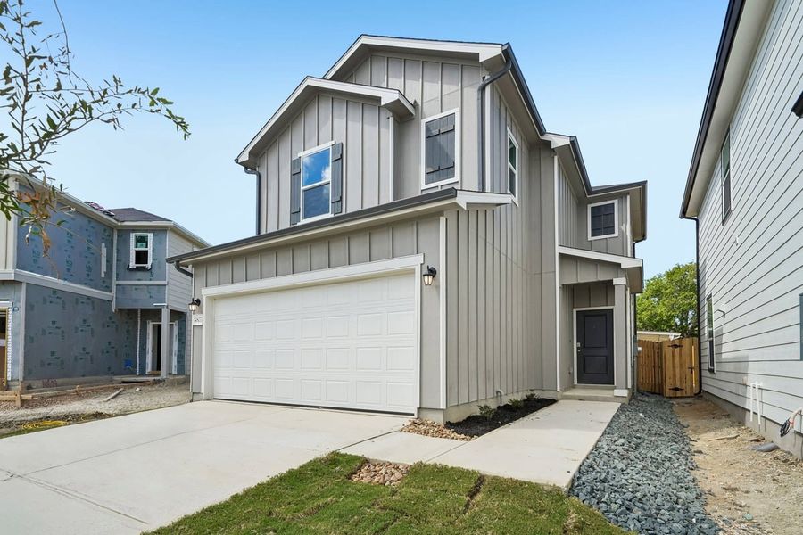 Front exterior of a new home in Nagel Crossing, San Antonio, TX, highlighting curb appeal (Image 21).