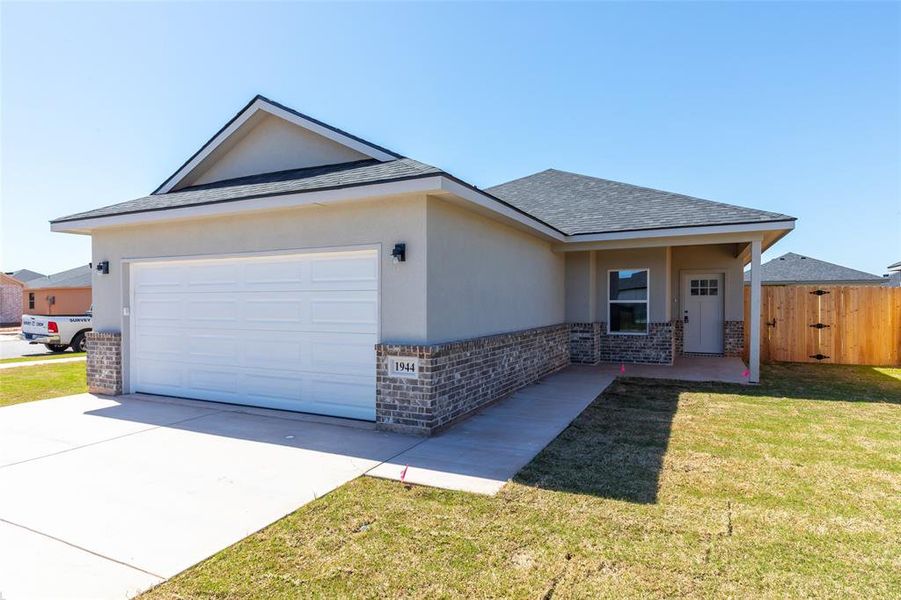 Front exterior of a new home in , Abilene, TX, highlighting curb appeal (Image 18).