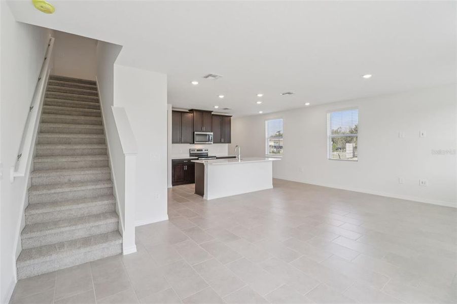 Spacious, unfurnished interior of a new home in The Reserve at Hammock Oaks Townes, Lady Lake (Image 14). Spacious, unfurnished interior of a new home in The Reserve at Hammock Oaks Townes, Lady Lake (Image 14).