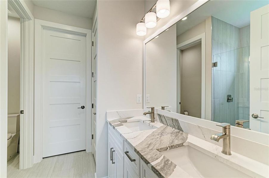 Furnished interior view inside a new home in Esplanade at Azario Lakewood Ranch, Lakewood Ranch (Image 19). Furnished interior view inside a new home in Esplanade at Azario Lakewood Ranch, Lakewood Ranch (Image 19).