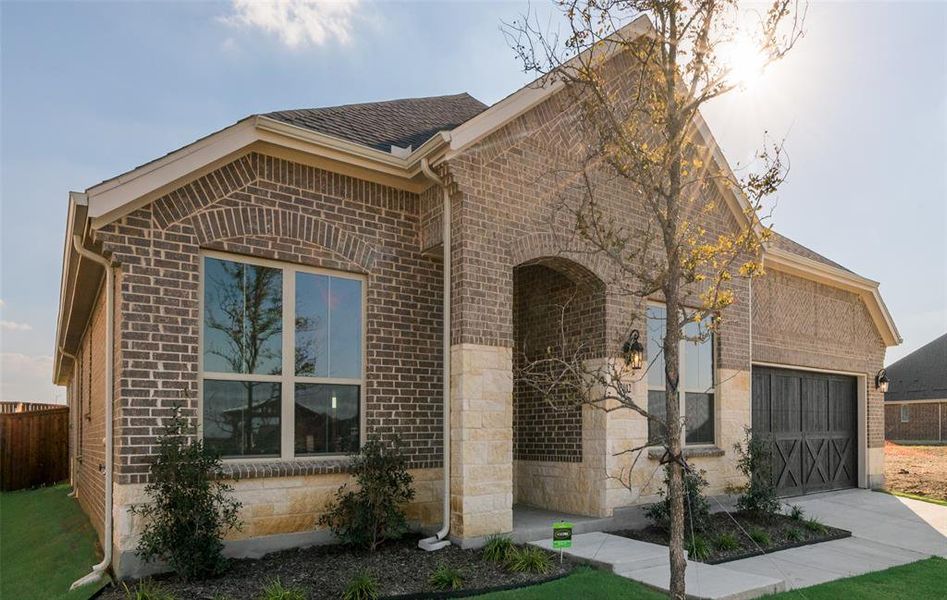 Exterior details and patio area of a home in Arbors at Legacy Hills, Celina (Image 3). Exterior details and patio area of a home in Arbors at Legacy Hills, Celina (Image 3).