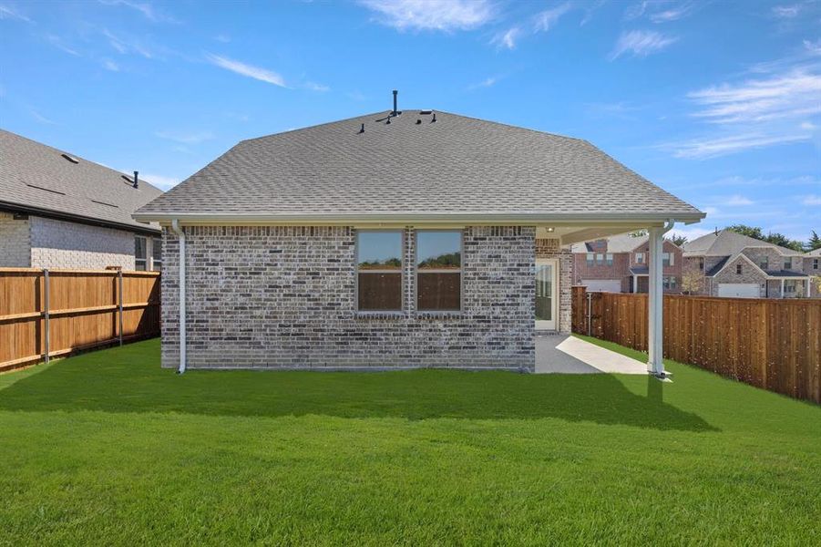 Exterior details and patio area of a home in Devonshire 40s, Forney (Image 4).