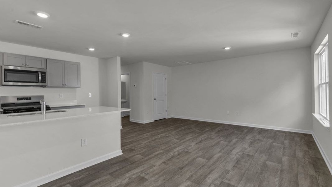 Spacious, unfurnished interior of a new home in The Townes at Honeycutt Oaks, Angier (Image 12). Spacious, unfurnished interior of a new home in The Townes at Honeycutt Oaks, Angier (Image 12).
