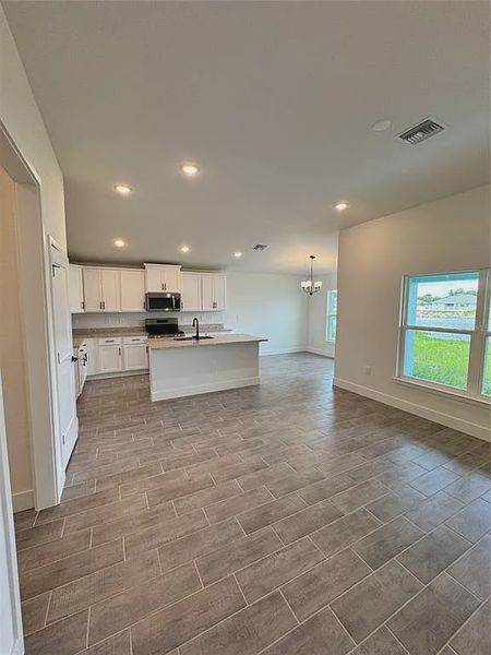 Spacious, unfurnished interior of a new home in Watercress Cove, North Port (Image 12). Spacious, unfurnished interior of a new home in Watercress Cove, North Port (Image 12).